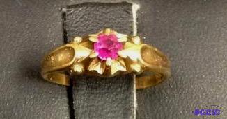 lot 31 image: Vintage 10k Red Stone Baby Ring