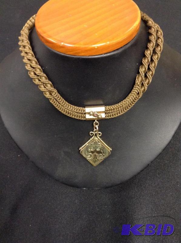 lot 49 image: Vintage locket necklace with woven hair