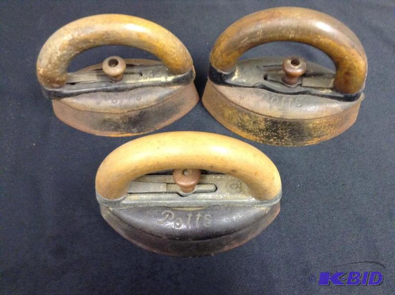 lot 63 image: Lot of 3 Vintage Dubuque Potts Sad irons