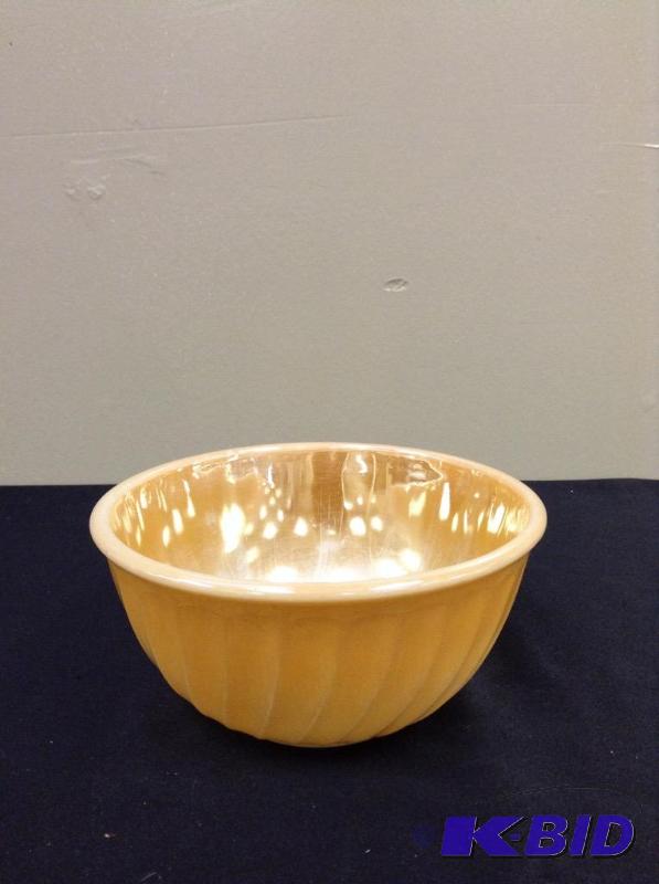 lot 86 image: Fire King Peach Luster 7 inch mixing bowl