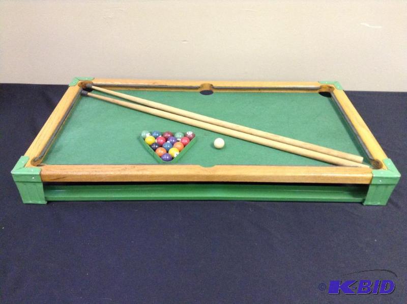 lot 94 image: Vintage toy pool table with balls and cue sticks