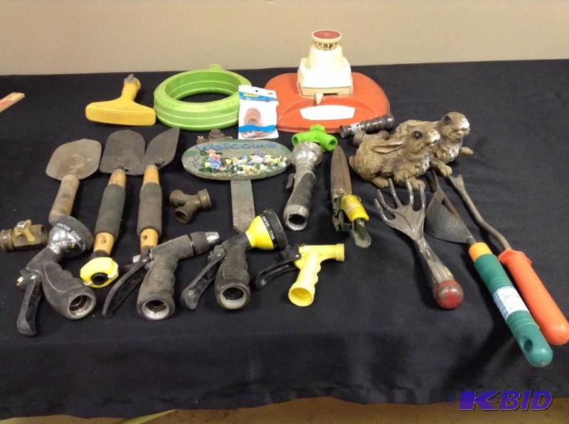 lot 152 image: Lot of lawn and garden tools and bunny statues
