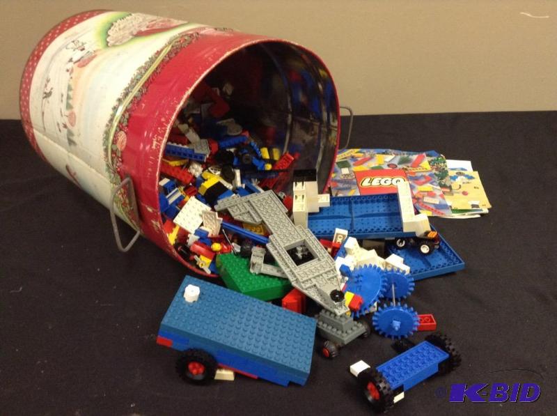 lot 153 image: Vintage tin full of vintage Legos