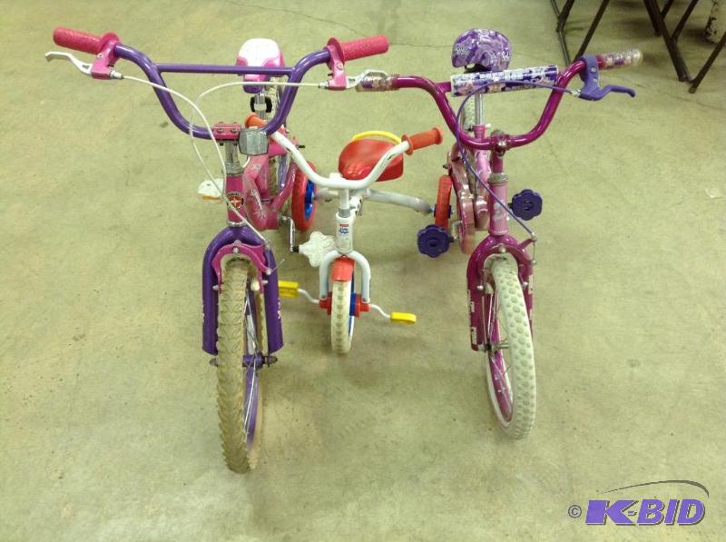 lot 190 image: Schwann, Barbie & Fisher Price Bikes & Trike