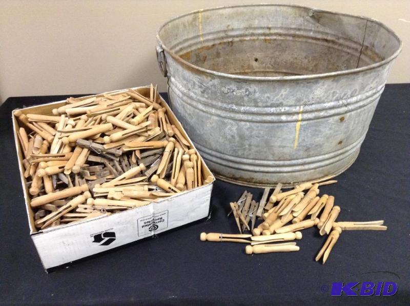 lot 39 image: Vintage wash bucket and clothespins