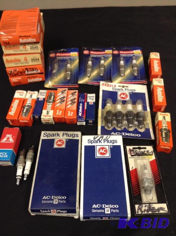 lot 53 image: Large Lot of various spark plugs and PCV valve in box