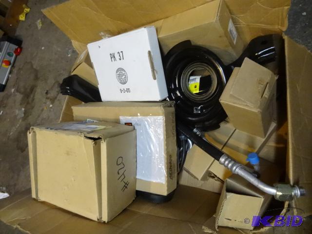 lot 157 image: Large Box of New GM Delco Replacement Parts...