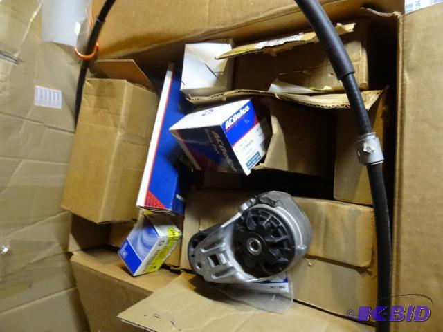lot 164 image: Large Box of New GM Delco Replacement Parts...