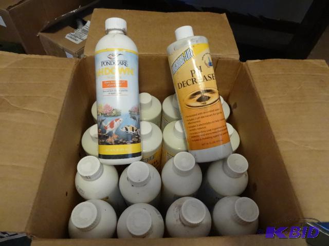 lot 36 image: Case of PH Up and PH Down pond care chemicals...