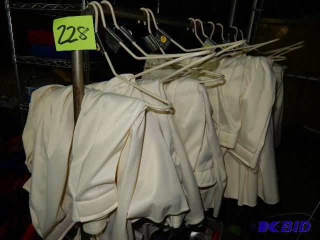lot 228 image: 6, 11 ft x 29 in Table Skirts.. Cream Colored...