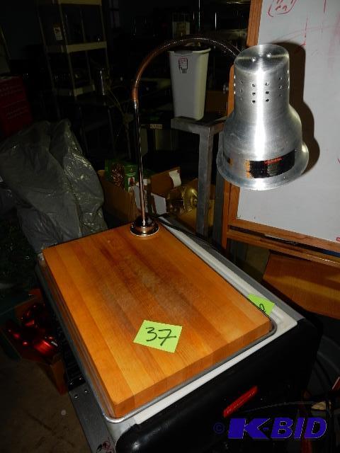lot 37 image: Infra Red light and cutting board