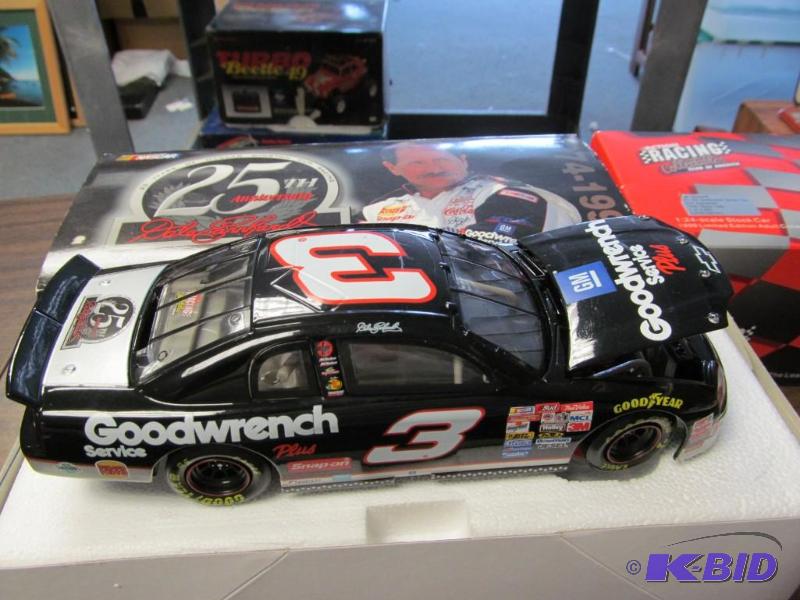 lot 1 image: 1999 Dale Earnhardt Sr #3 GMGW Service Plus 25th Anniversary 124 Clear Window Bank 1 of 8000 by Action
