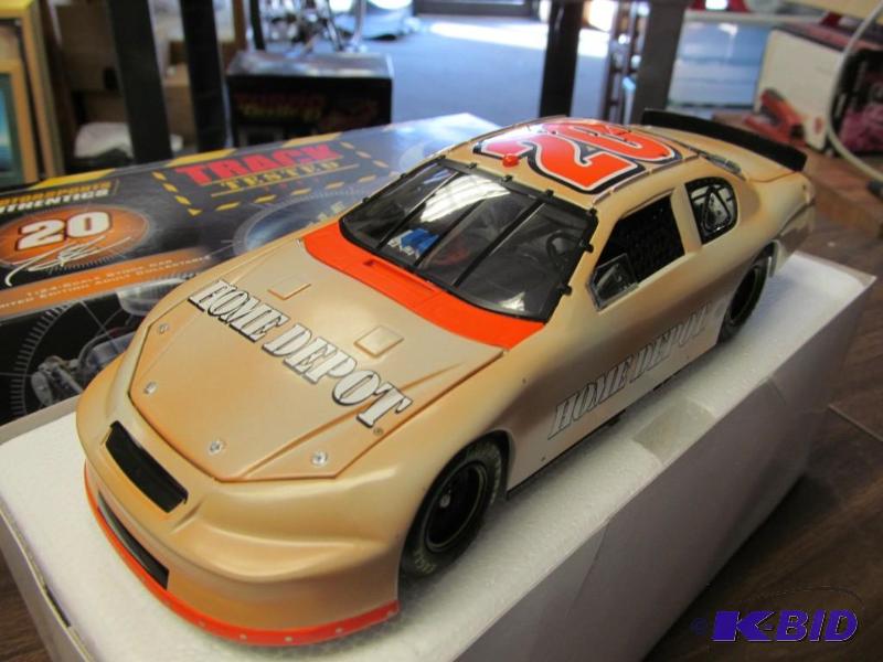 lot 11 image: 2006 Tony Stewart Home Depot  Track Tested 124 Clear Window Test Car by Action