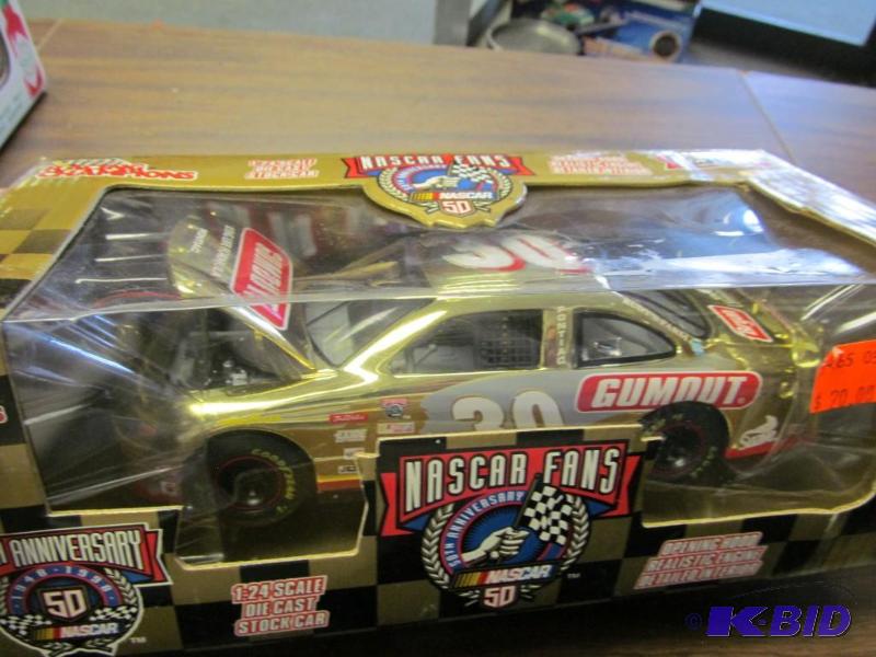 lot 15 image: 1998 Derrike Cope #30 Gumout Gold 124 Clear Window Car 1 of 1,998 by Racing Champions