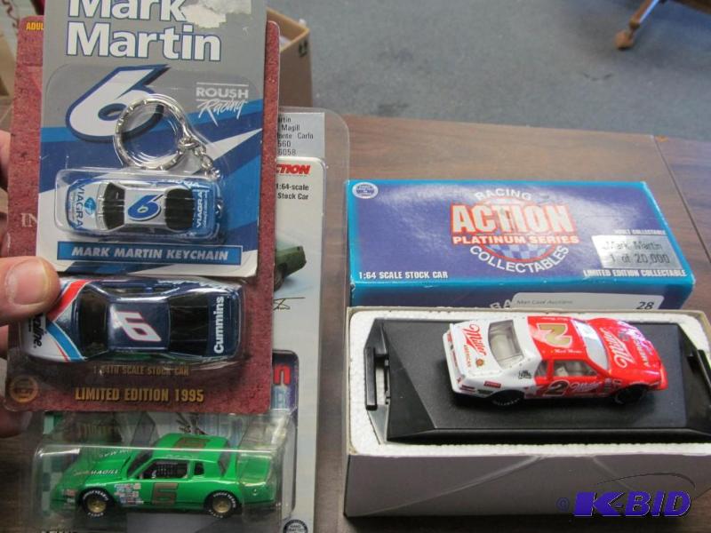 lot 28 image: Lot of 4 Mark Martin 164 Diecast Cars Action
