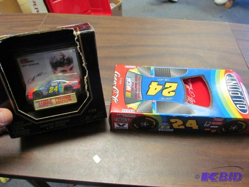 lot 29 image: Jeff Gordon 1994 164 Diecast & Slipper Socks
