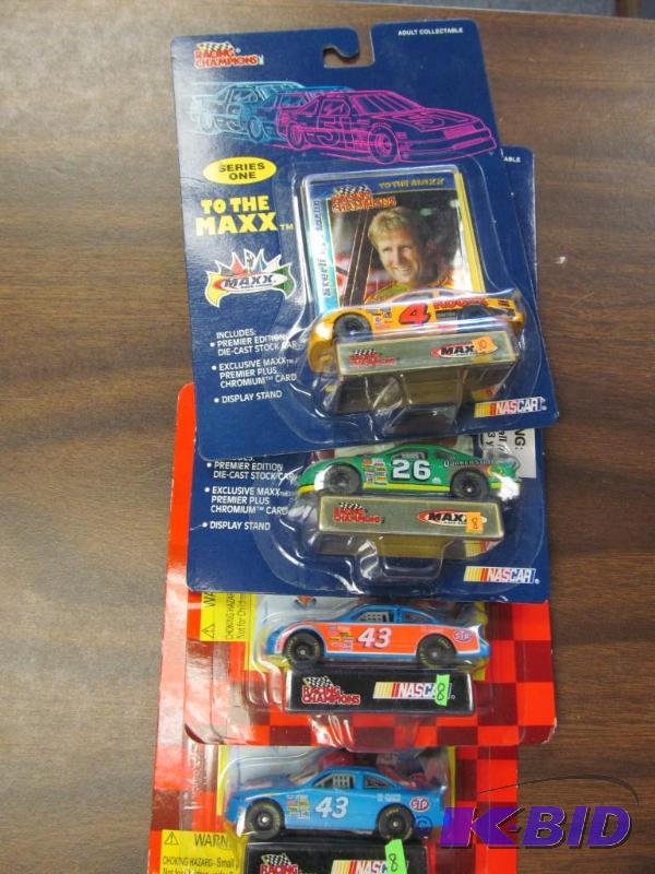lot 59 image: Lot of 4 Racing Champions 164 NASCAR Diecast
