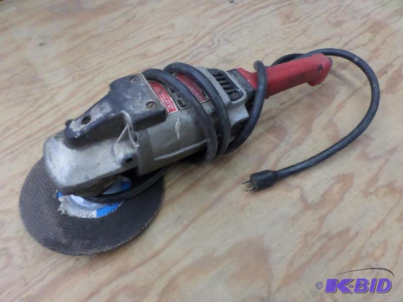 lot 23 image: Milwaukee Heavy Duty 9" GrinderSander...