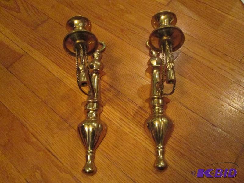 lot 311 image: 2 brass colored wall hanging candle holders...