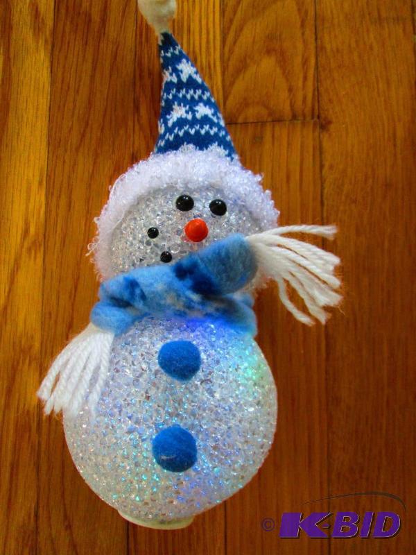 lot 34 image: Color changing lighted snowman...