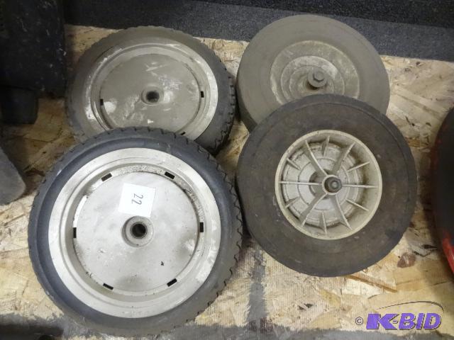 4 lawn mower wheels....