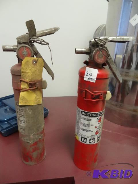 2 fully charged fire extinguishers...