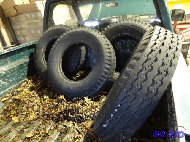 Set of 4 trailer tires. 7.00-15E. Load range ...