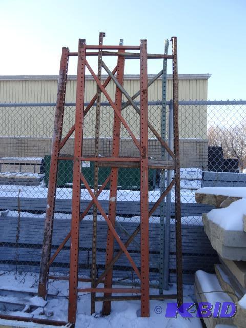 4 pallet rack uprights. 3 are tear drop and 1...