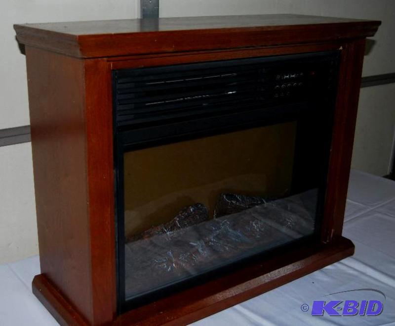 lot 60 image: Rolling Infrared Fireplace With Mantel, adjus...
