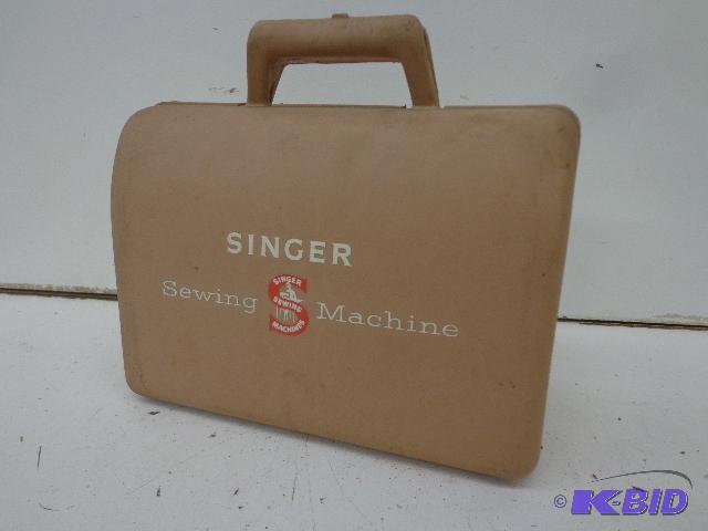 lot 35 image: Portable Sewing Machine   Singer  Hand Operat...