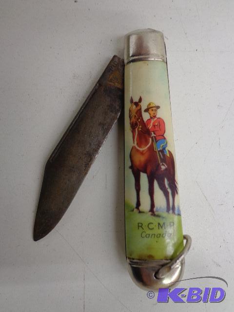 lot 4 image: Pocket Knife   RCMP Canada  Looks like Mother...
