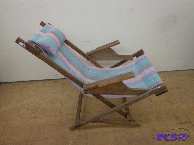 lot 8 image: Canvas Lounge Chair   Multi Color Canvas  Pil...