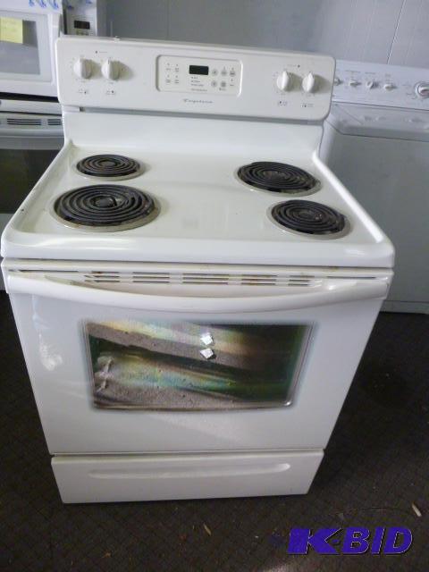 lot 30 image: Frigidaire Electric Range Almond, tested and ...