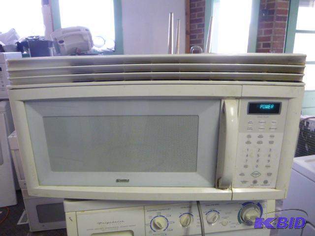 lot 50 image: Kenmore Over the Range Microwave Missing plat...