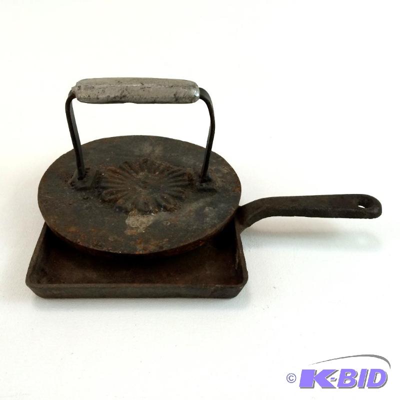 lot 23 image: Lot of 2 Smaller Cast Iron Cookware  - Square Skillet & Round Press