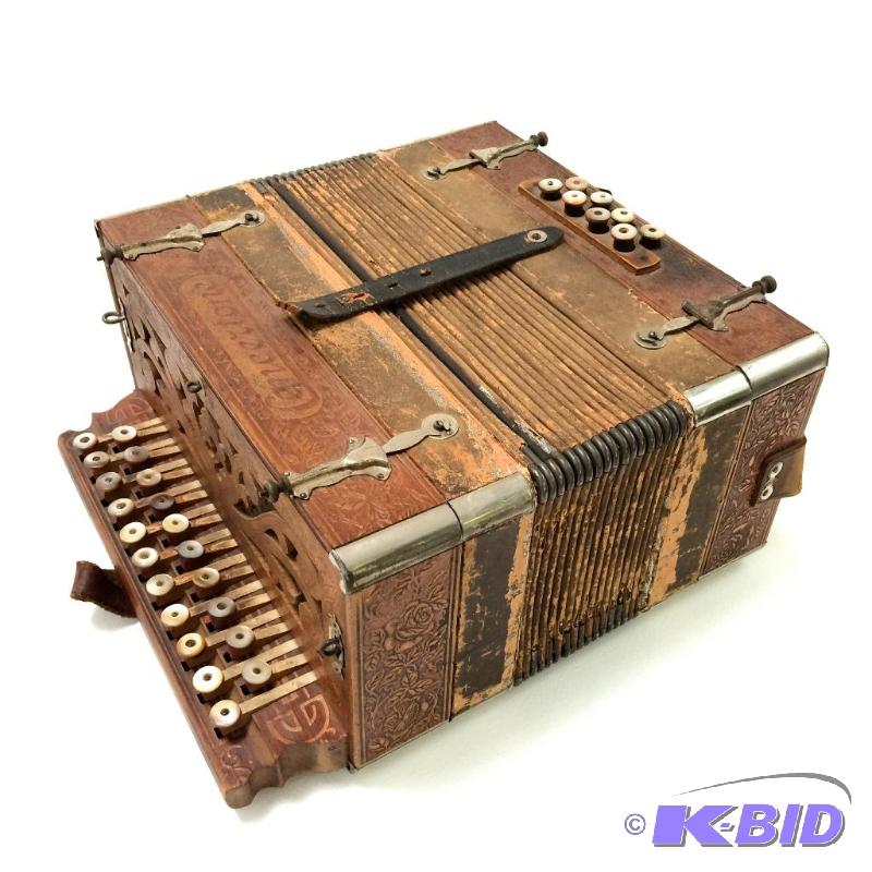 lot 8 image: Antique German Button Box Accordion - Openwork Body, Paper Bellows, Mother of Pearl Buttons