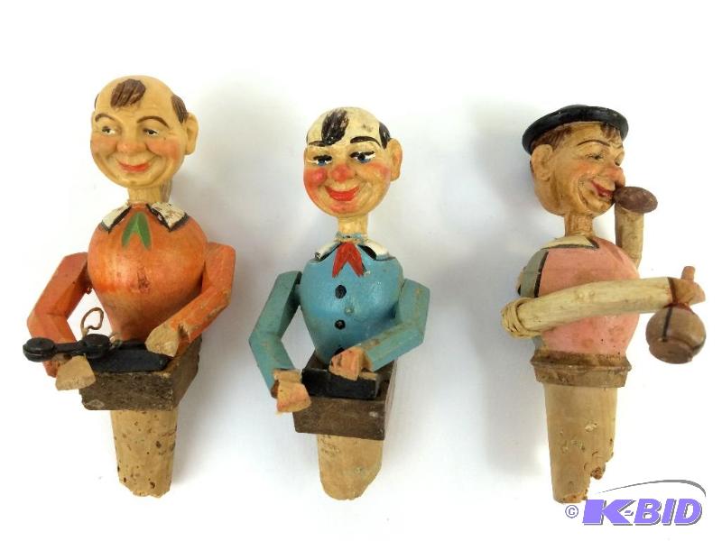 lot 18 image: Animated Wine Bottle Stoppers with Carved Wooden Bodies with Character Heads