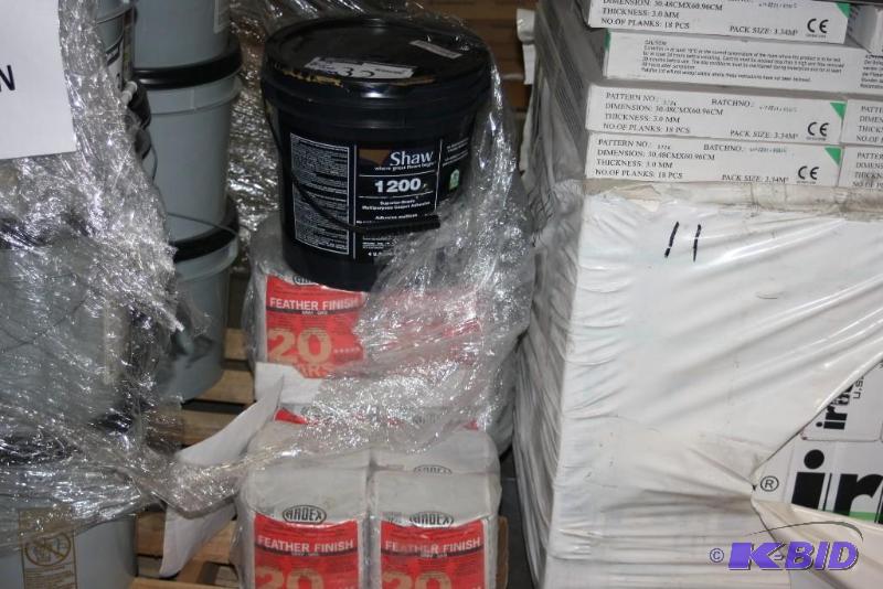 lot 32 image: Bucket of Shaw 1200 Multipurpose Carpet Adhesive & Bags of Ardex Feather Finish Gray