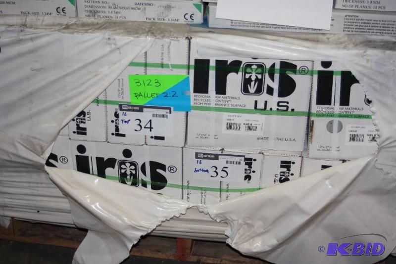 lot 34 image: Boxes of Iris Vinyl Flooring Tiles Gray Color High Performance Service, 12 x 24.