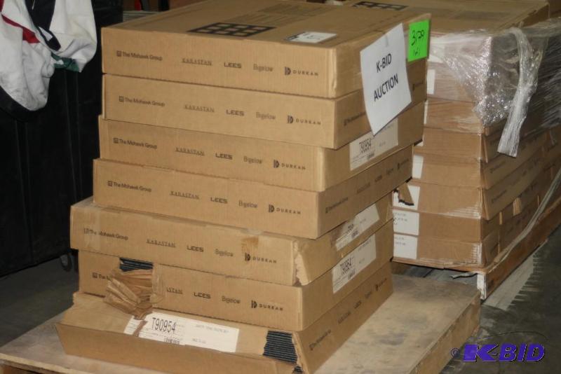 lot 57 image: Pallet Lot of Miscellaneous Black Vinyl Flooring Pieces