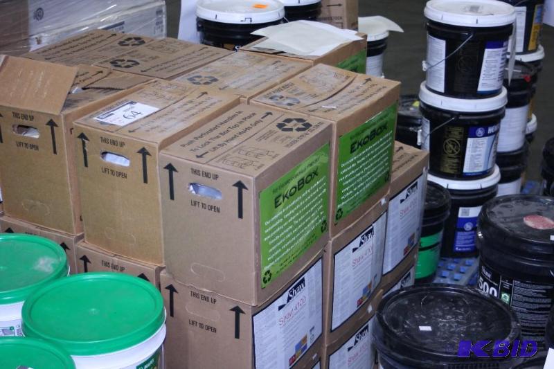 lot 64 image: Boxes of Dyna-Mix NPB Modular Pressure Sensitive Adhesive Expired