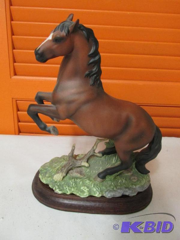 Beautiful Horse Statue on a Wooden Stand