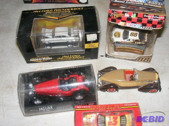 Variety of toy race cars and other