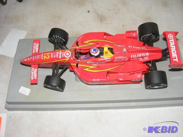 Target model race car on display stand