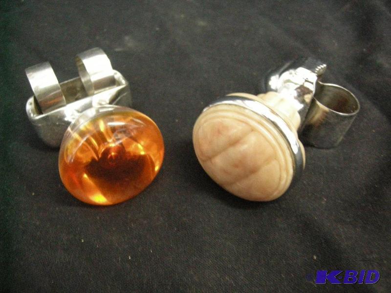 lot 122 image: Vintage steering wheel knobs