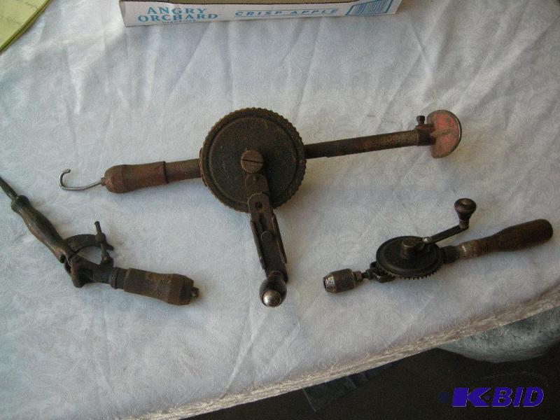 lot 34 image: Antique drill brace and accessories