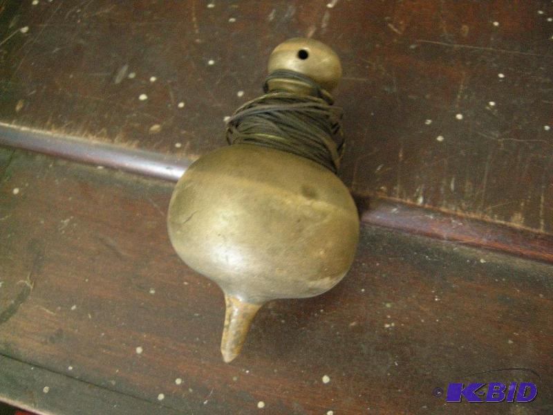 lot 45 image: Early brass plumb bob