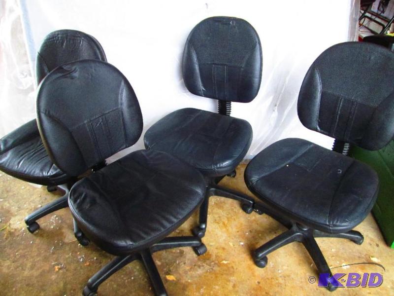 Lot of 4 office chairs, one has a small rip b...