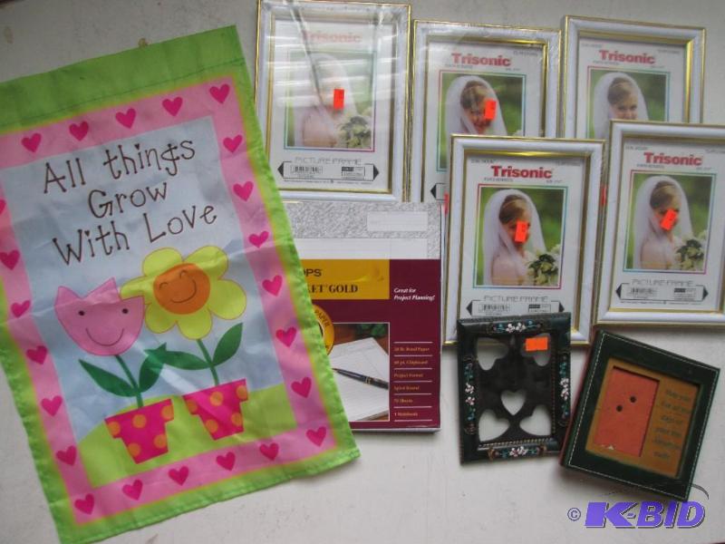 Assorted pictgure frames and a planner book w...