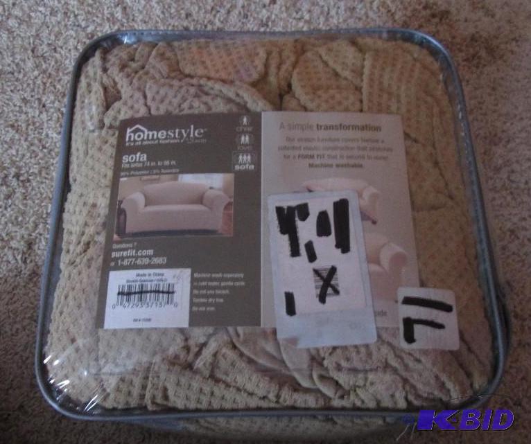 lot 21 image: Homestyle sofa cover, fits 74in. To 96in., ma...